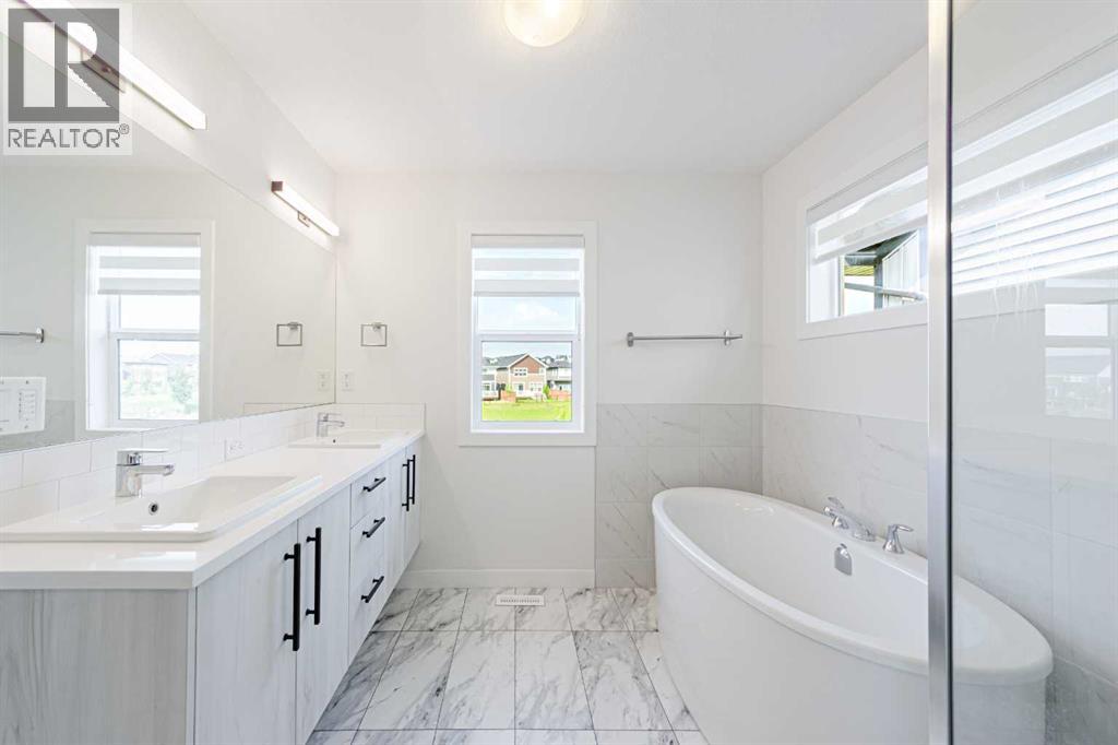 293 Carringsby Way NW, Calgary, Alberta  T3P 1T6 - Photo 25 - A2331276