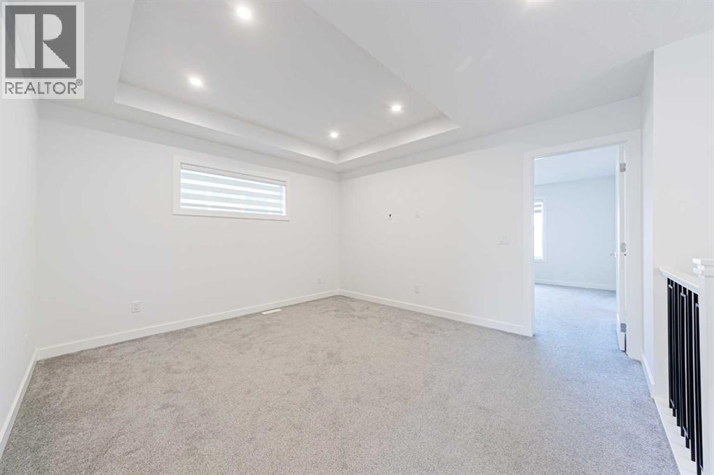 293 Carringsby Way NW, Calgary, Alberta  T3P 1T6 - Photo 19 - A2331276