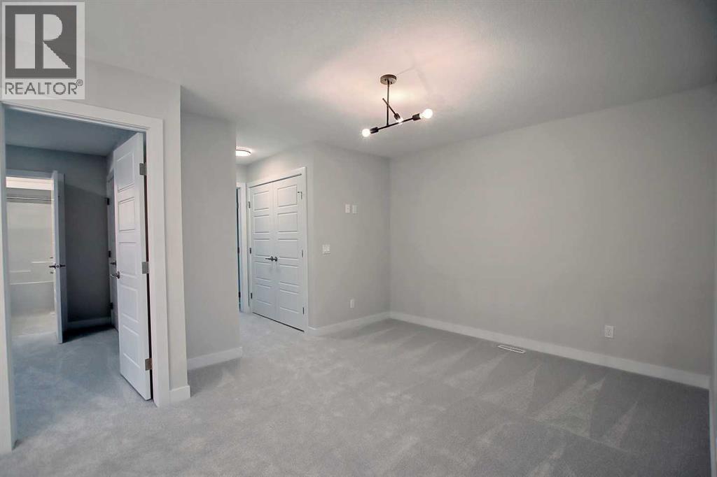 12 Topaz Place, Cochrane, Alberta  T4C 3K2 - Photo 21 - A2337778