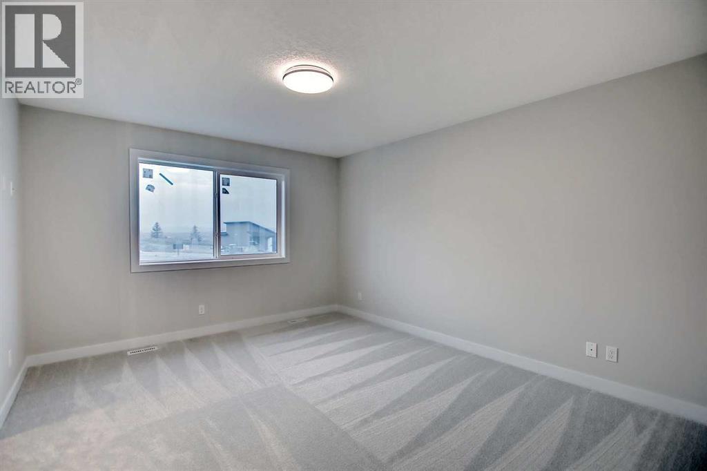 12 Topaz Place, Cochrane, Alberta  T4C 3K2 - Photo 23 - A2337778