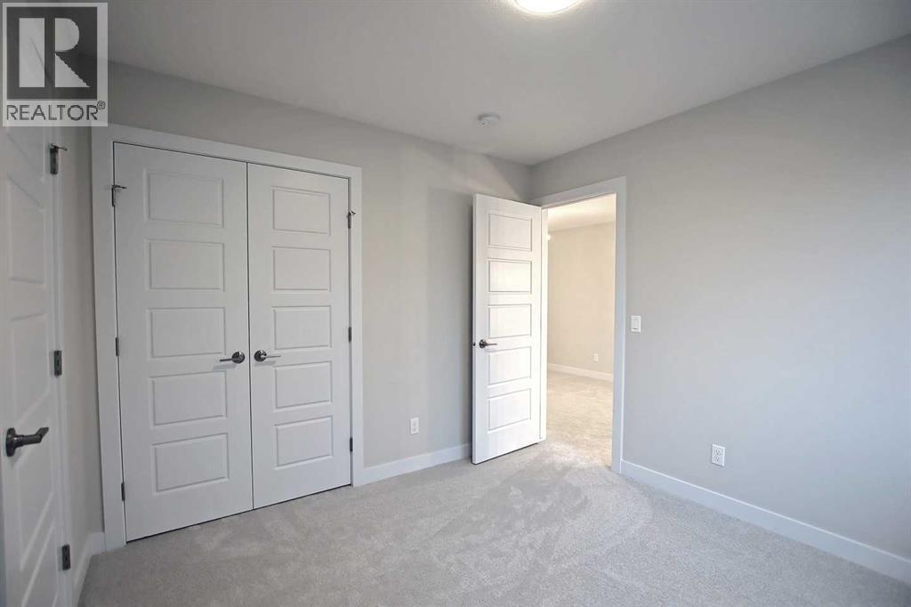 12 Topaz Place, Cochrane, Alberta  T4C 3K2 - Photo 31 - A2337778
