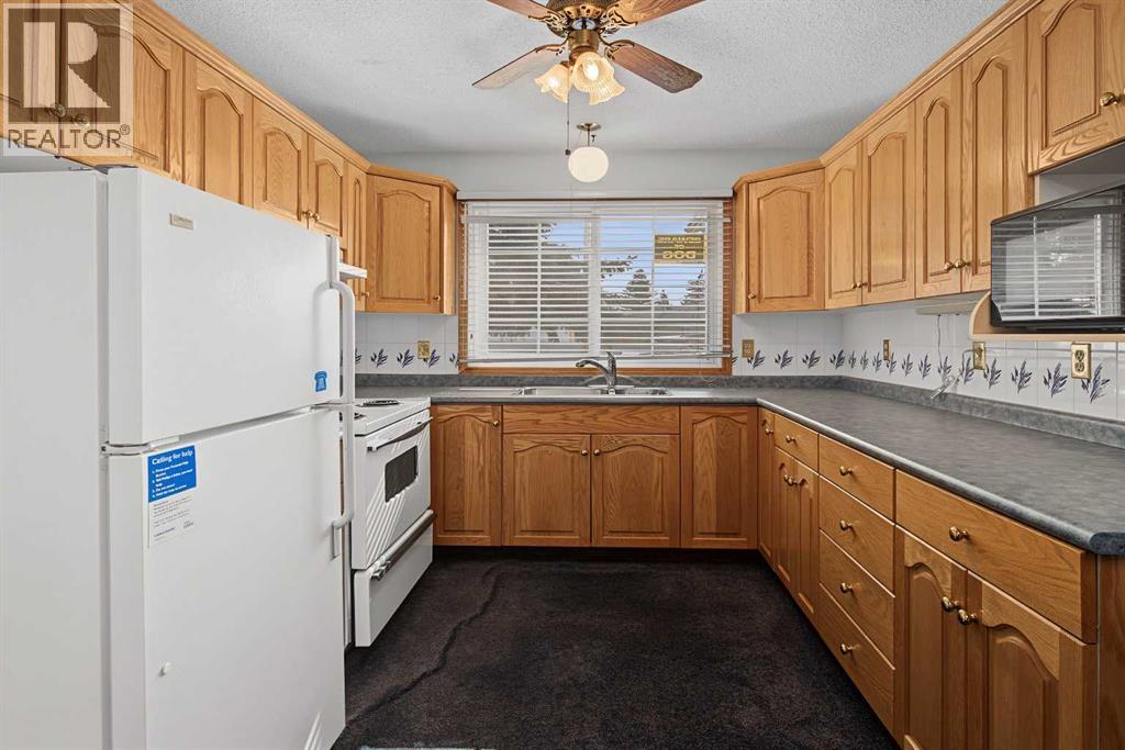 75, 175 Manora Place NE, Calgary, Alberta T2A 5P7 - Photo 7 - A2335487
