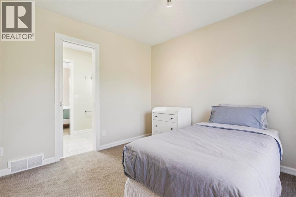 174 Sienna Hills Drive SW, Calgary, Alberta  T3H 2E2 - Photo 31 - A2338309