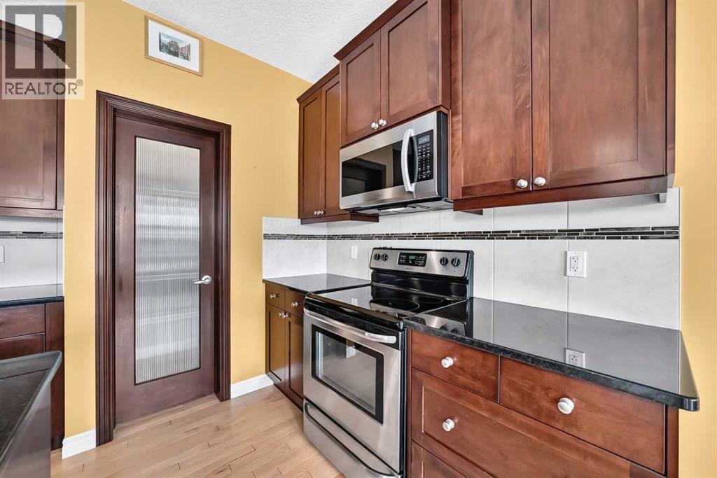 168 Heritage Boulevard, Cochrane, Alberta  T4C 0S6 - Photo 6 - A2338215