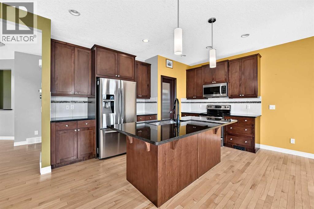 168 Heritage Boulevard, Cochrane, Alberta  T4C 0S6 - Photo 5 - A2338215