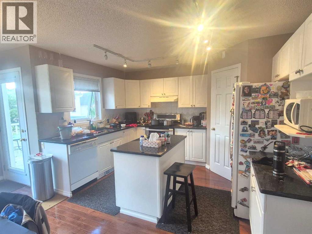 127 Hampstead Circle NW, Calgary, Alberta  T3A 5P3 - Photo 4 - A2328201