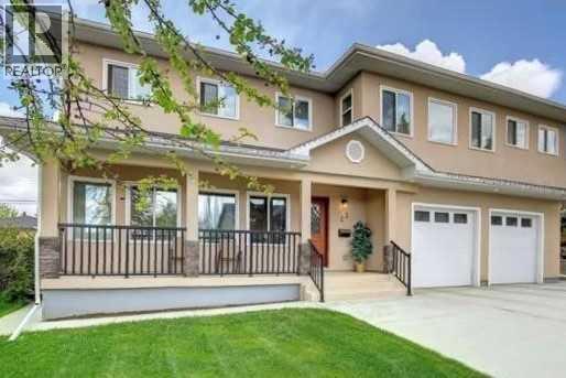 23 Cheltenham Road NW, Calgary, Alberta  T2L 0M4 - Photo 1 - A2283265