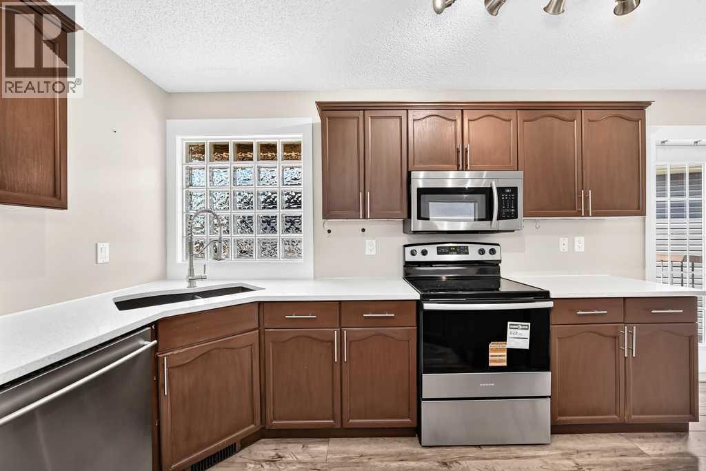 222 Covewood Close NE, Calgary, Alberta  T3K 5A1 - Photo 9 - A2326607
