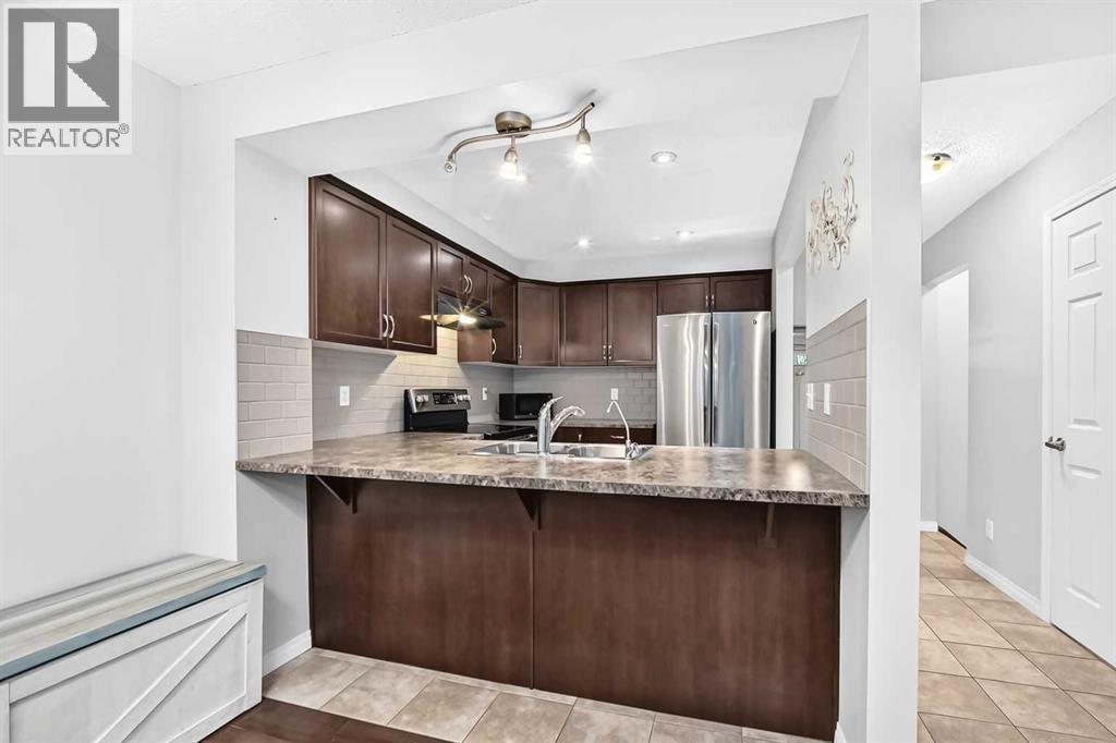 3136 Windsong Boulevard Sw, Airdrie, Alberta  T4B 3T3 - Photo 4 - A2337337