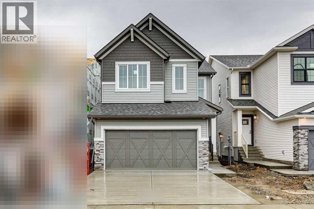 109 Creekstone Place SW, Calgary, Alberta  T2X 4Y3 - Photo 2 - A2290725