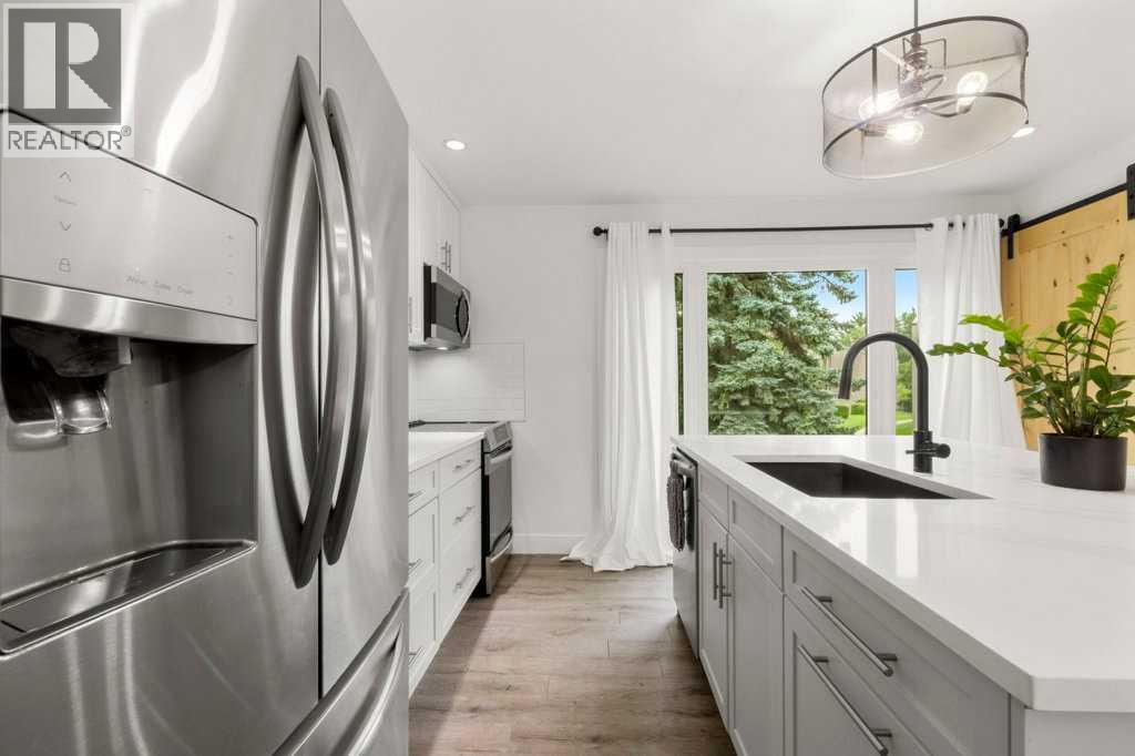3909 Point Mckay Road NW, Calgary, Alberta T3B 4V7 - Photo 13 - A2337197