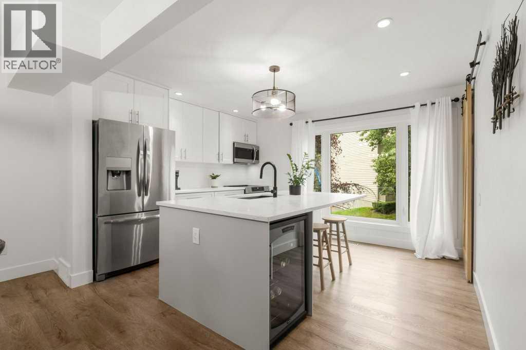3909 Point Mckay Road NW, Calgary, Alberta T3B 4V7 - Photo 9 - A2337197