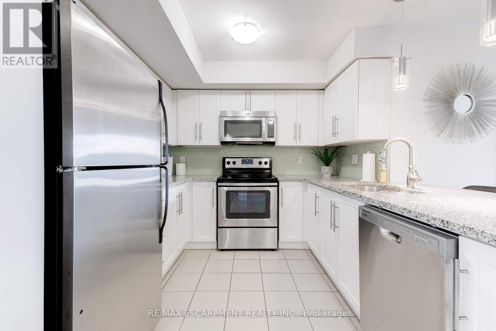 406 - 1045 Nadalin Heights, Milton, Ontario  L9T 8R5 - Photo 4 - W13691554