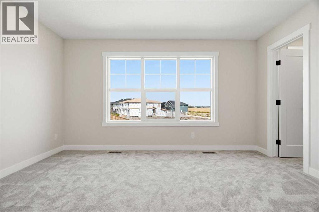 358 Kinniburgh Loop, Chestermere, Alberta  T1X 3C4 - Photo 32 - A2328912