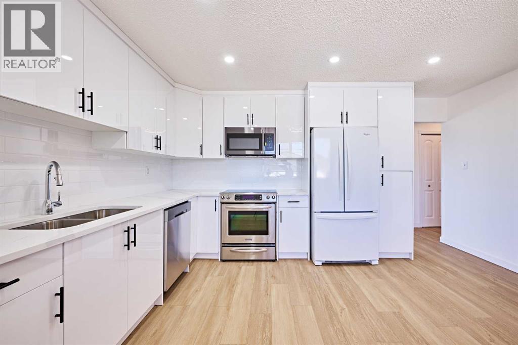 3644 Dover Ridge Drive SE, Calgary, Alberta  T2B 2B4 - Photo 10 - A2337689
