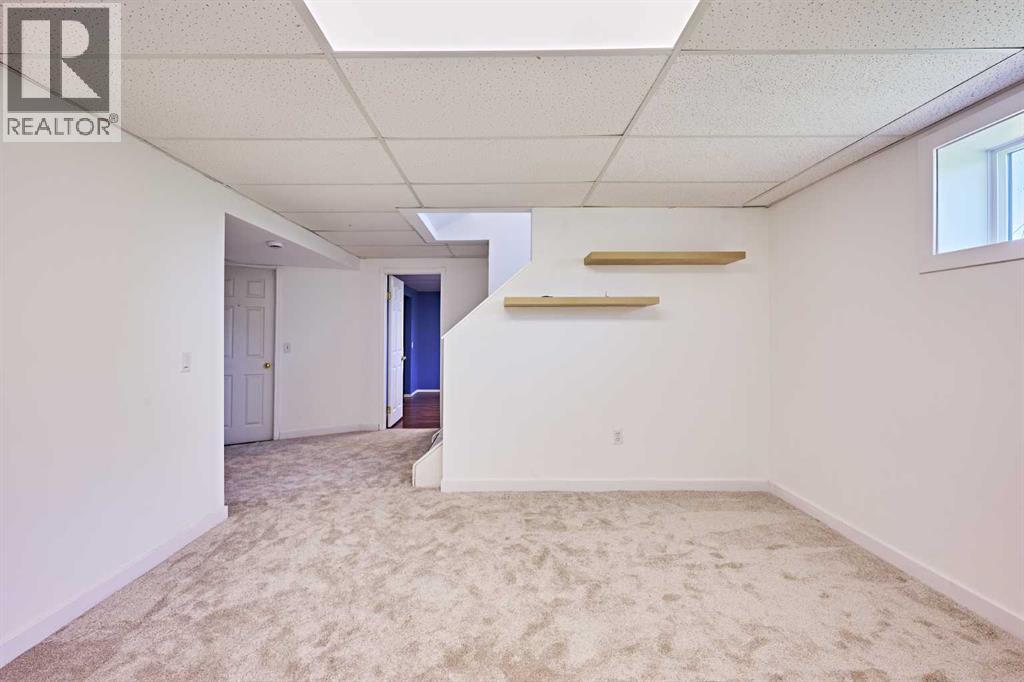3644 Dover Ridge Drive SE, Calgary, Alberta  T2B 2B4 - Photo 25 - A2337689