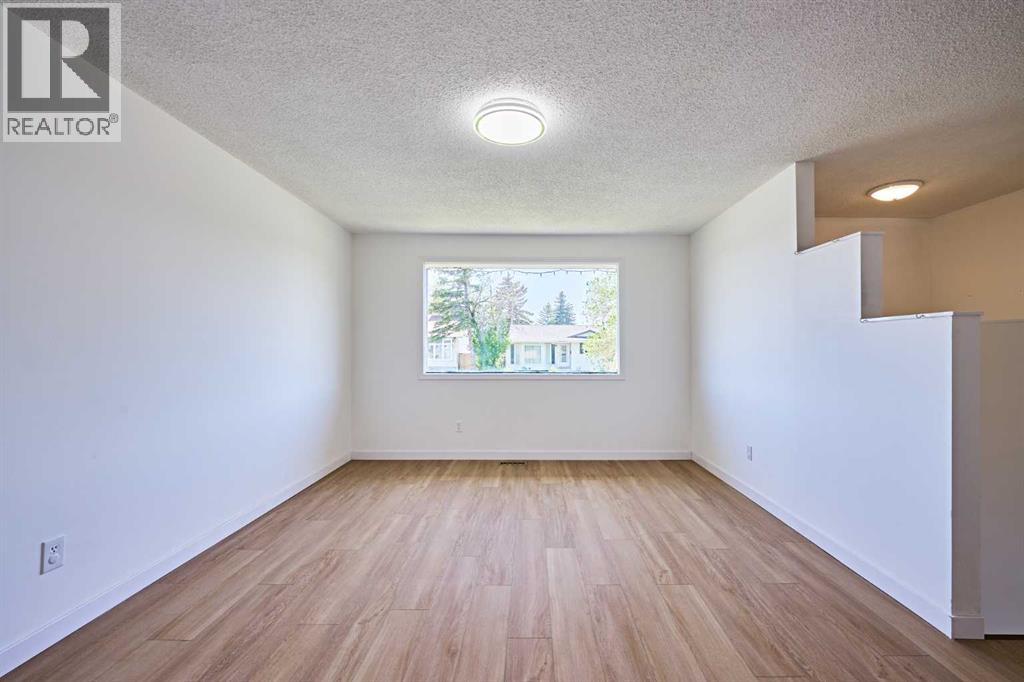 3644 Dover Ridge Drive SE, Calgary, Alberta  T2B 2B4 - Photo 3 - A2337689