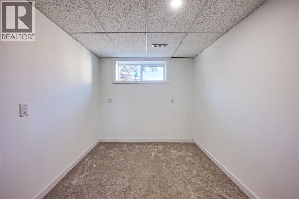 3644 Dover Ridge Drive SE, Calgary, Alberta  T2B 2B4 - Photo 31 - A2337689