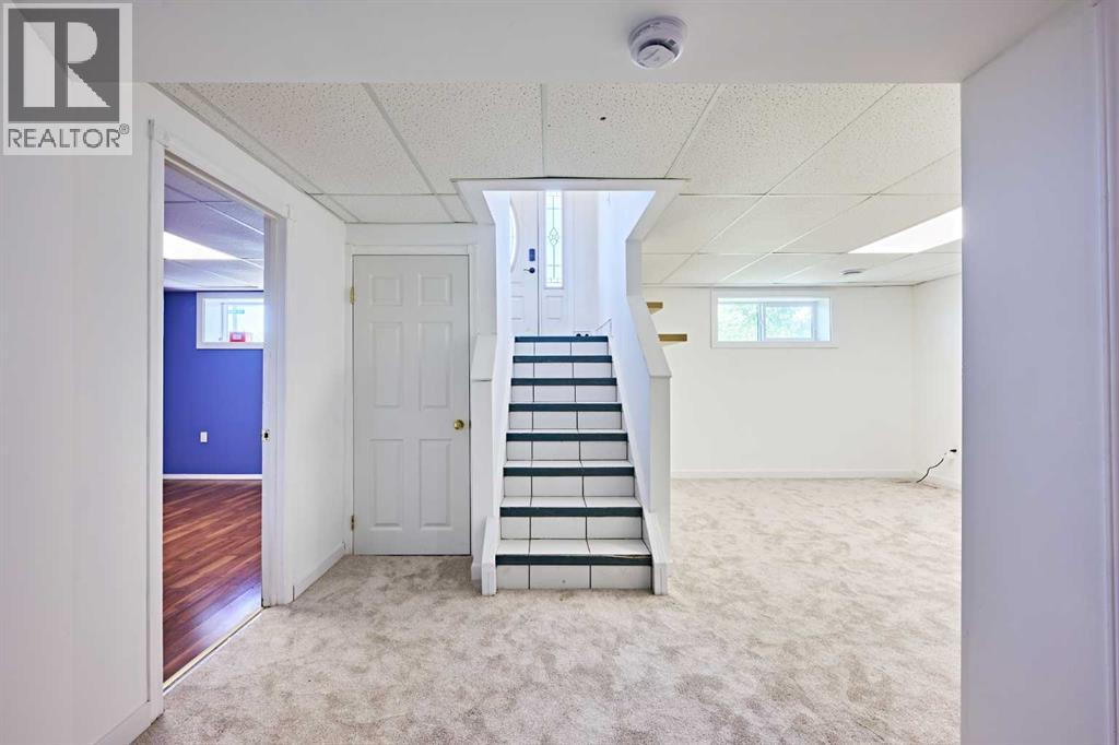 3644 Dover Ridge Drive SE, Calgary, Alberta  T2B 2B4 - Photo 22 - A2337689
