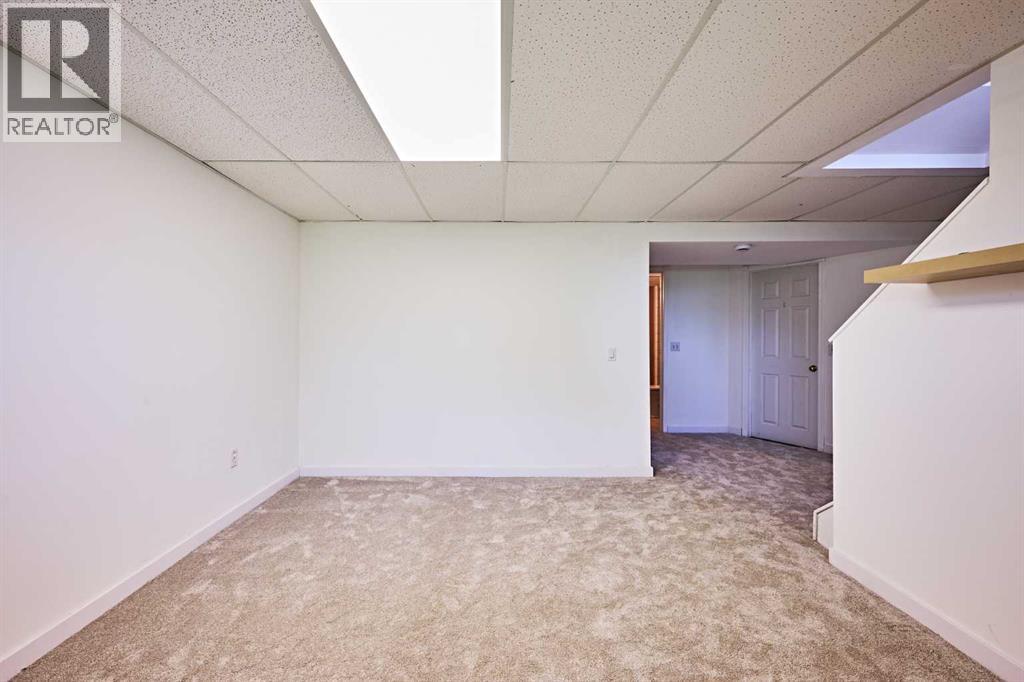 3644 Dover Ridge Drive SE, Calgary, Alberta  T2B 2B4 - Photo 26 - A2337689