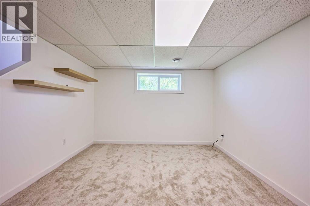 3644 Dover Ridge Drive SE, Calgary, Alberta  T2B 2B4 - Photo 24 - A2337689
