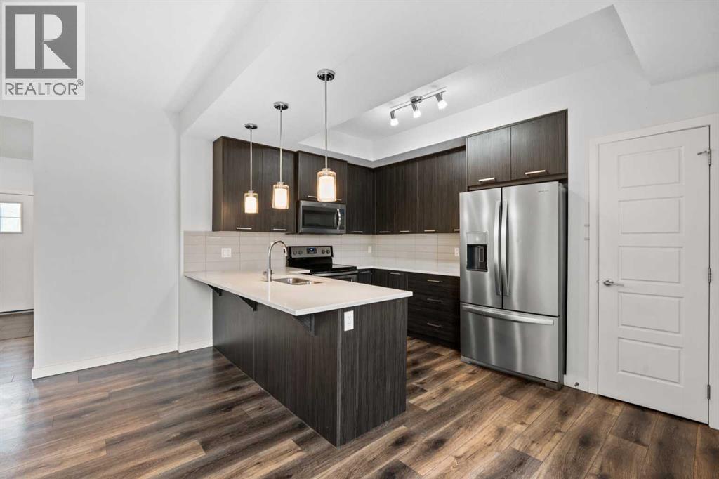 103, 115 Sagewood Drive SW, Airdrie, Alberta  T4B 0M3 - Photo 9 - A2338106