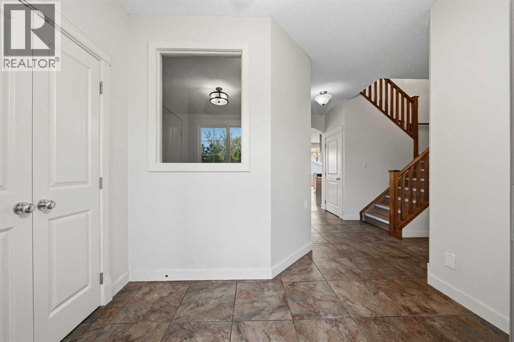 204 Eversyde Mews SW, Calgary, Alberta  T2Y 5A4 - Photo 3 - A2337730