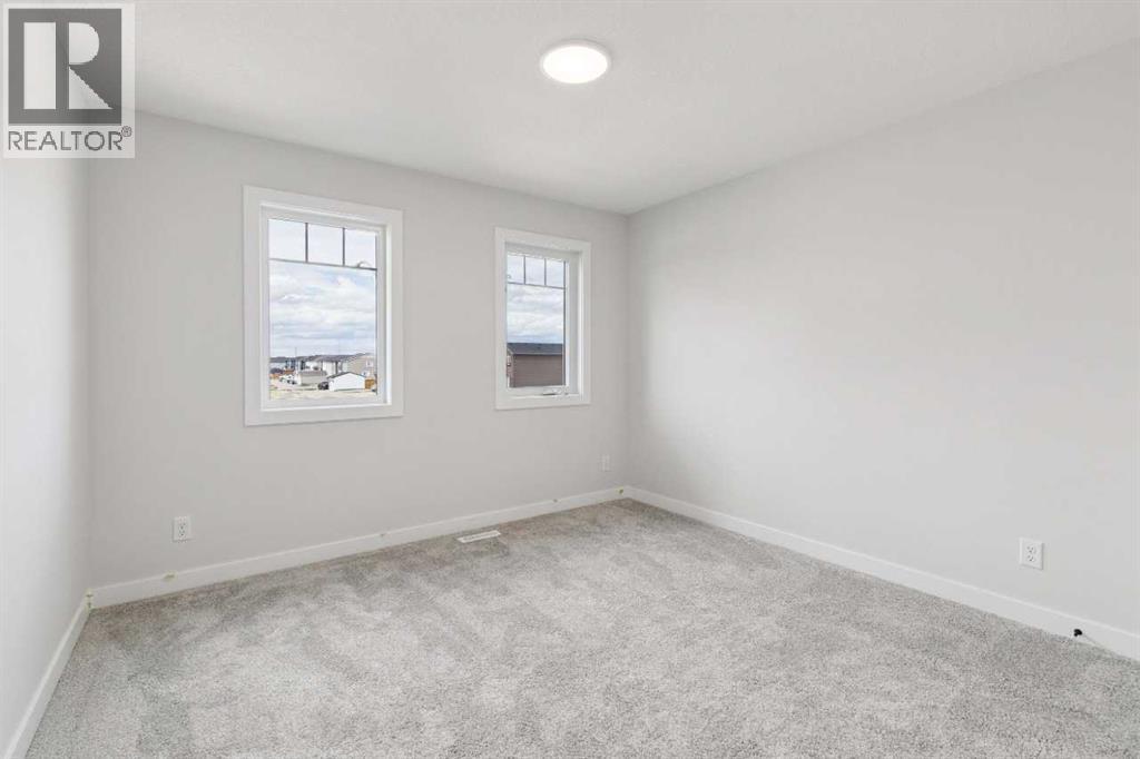 546 Hotchkiss Manor, Calgary, Alberta  T3S 0J9 - Photo 29 - A2308251