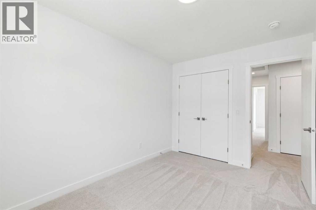 84, 145 Chelsea Mews, Chestermere, Alberta  T1X 3H1 - Photo 30 - A2332564