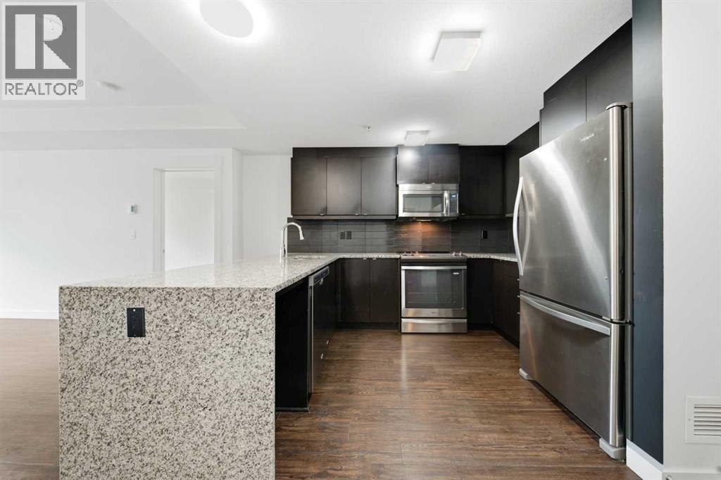 109, 45 Aspenmont Heights SW, Calgary, Alberta  T3H 0E6 - Photo 5 - A2336987