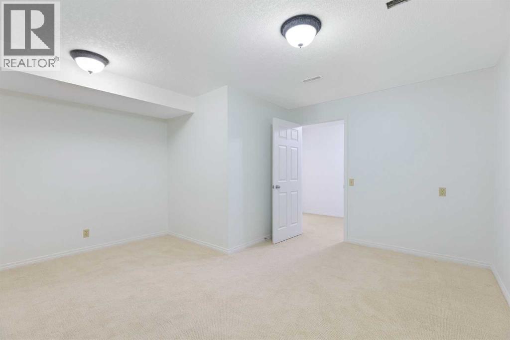 90 Martinridge Crescent NE, Calgary, Alberta  T3J 3M4 - Photo 30 - A2337975