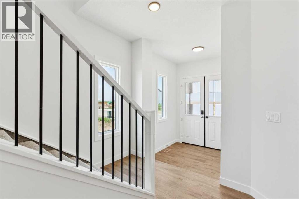 427 Bridgeport Glen, Chestermere, Alberta  T1X 3C9 - Photo 7 - A2336134