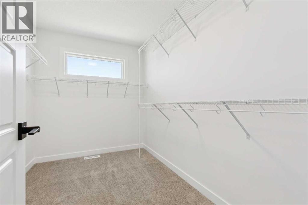 427 Bridgeport Glen, Chestermere, Alberta  T1X 3C9 - Photo 38 - A2336134
