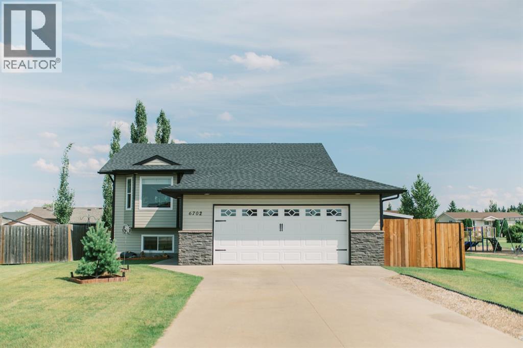 6702 43 Avenue Close, Stettler, Alberta  T4K 1k6 - Photo 2 - A2338133