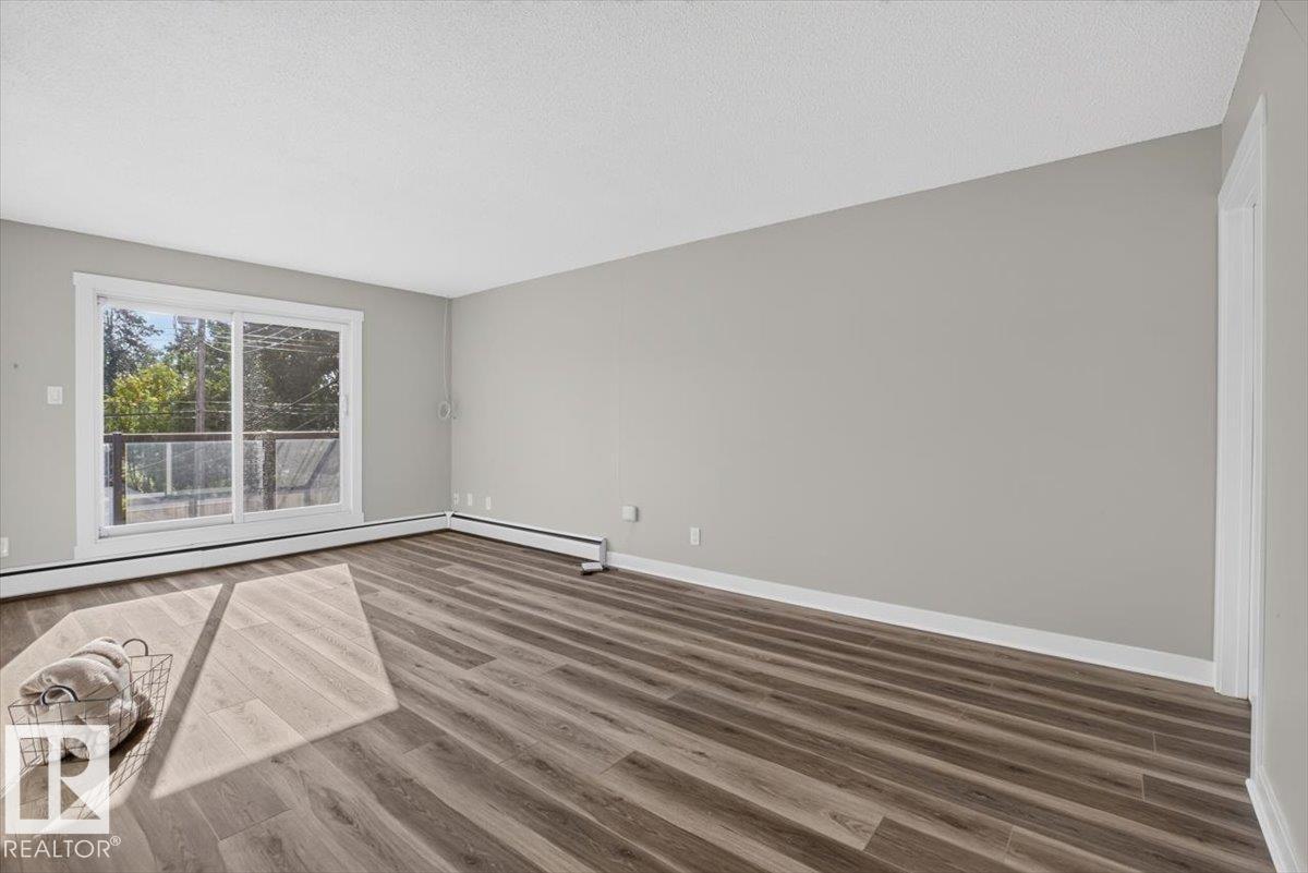 #205 11429 124 ST NW