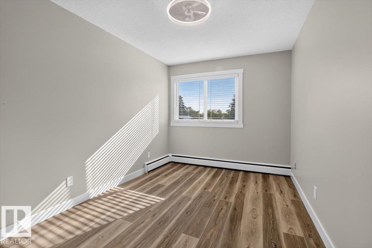 #205 11429 124 ST NW