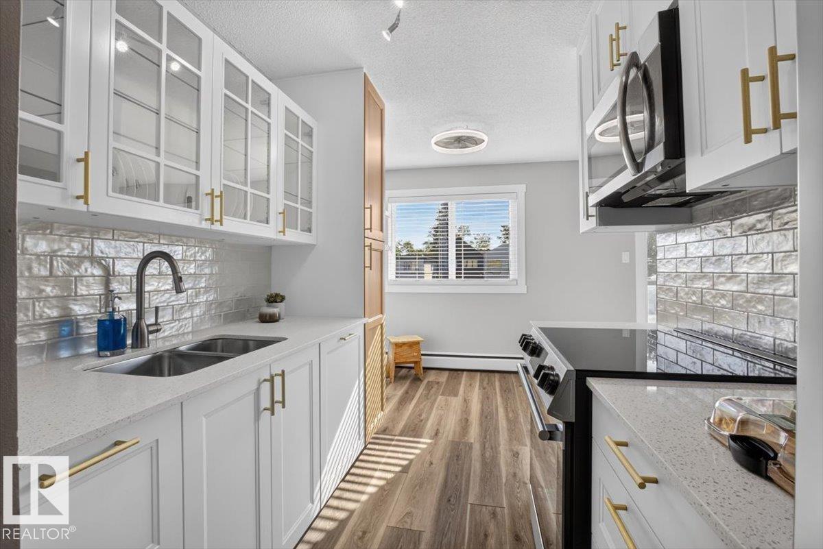 #205 11429 124 ST NW