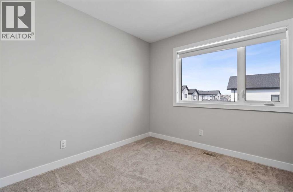 32 Evanscrest Court NW, Calgary, Alberta  T3P 1S2 - Photo 20 - A2333920