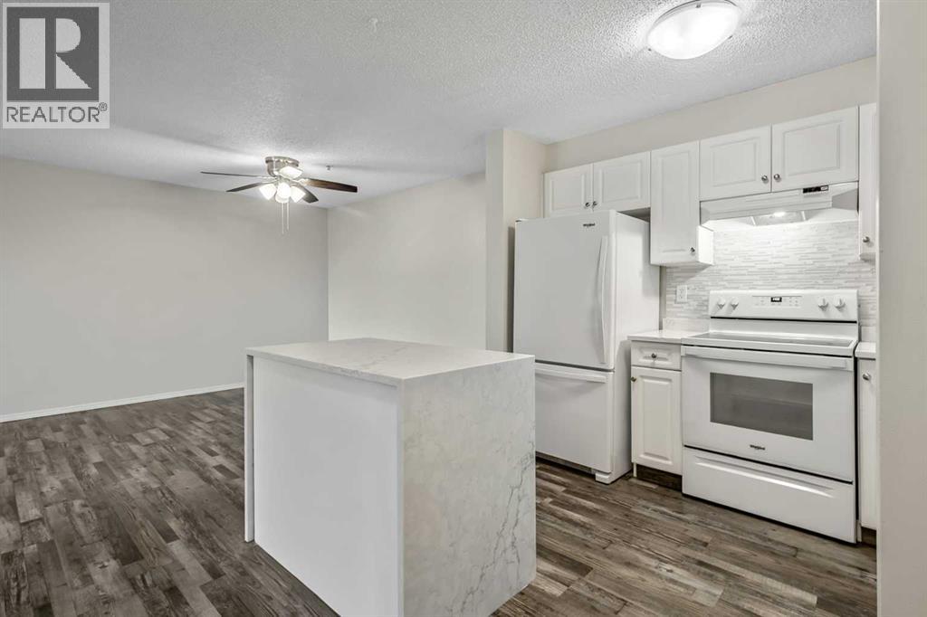 1211, 1211 Tuscarora Manor NW, Calgary, Alberta  T3L 2J9 - Photo 5 - A2337831