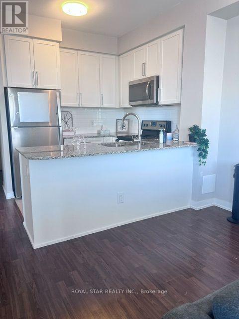 1107 - 840 Queens Plate Drive, Toronto, Ontario  M9W 0E7 - Photo 2 - W13692454