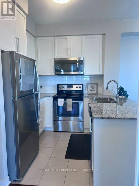 1107 - 840 Queens Plate Drive, Toronto, Ontario  M9W 0E7 - Photo 3 - W13692454