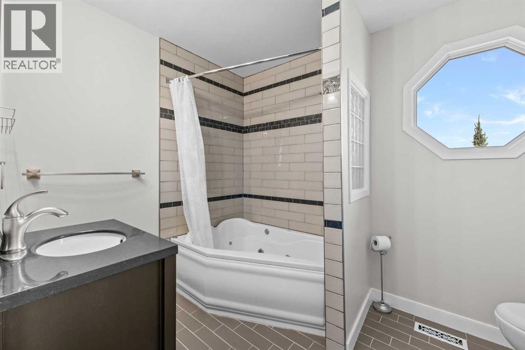 8 Millside Court SW, Calgary, Alberta  T2Y 2P5 - Photo 44 - A2338338