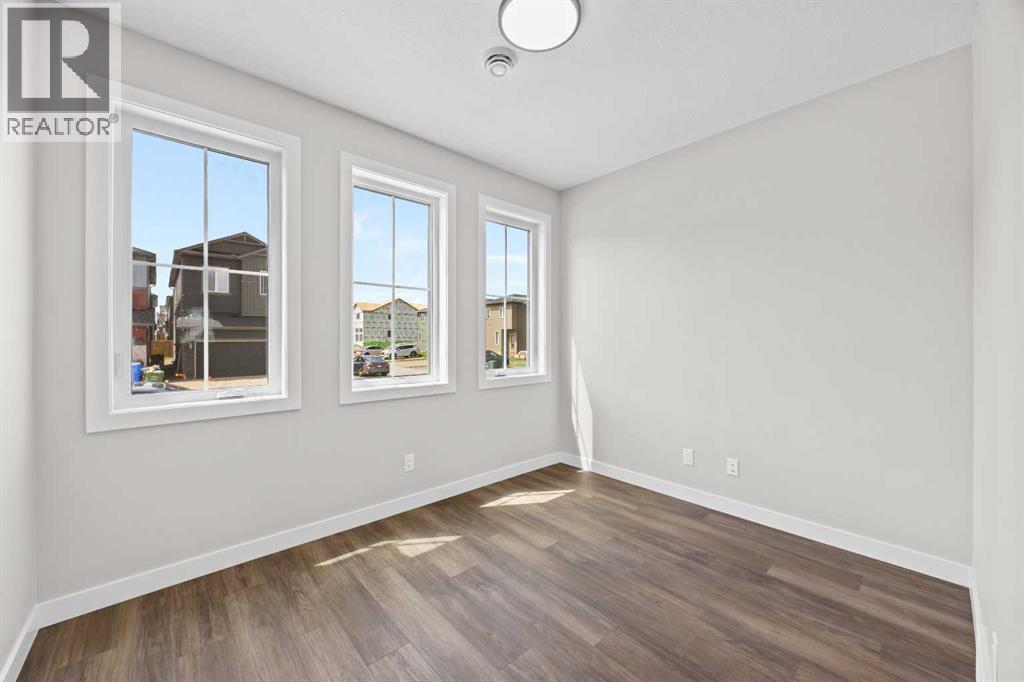 72 Amblefield View NW, Calgary, Alberta  T3P 2L6 - Photo 5 - A2323080