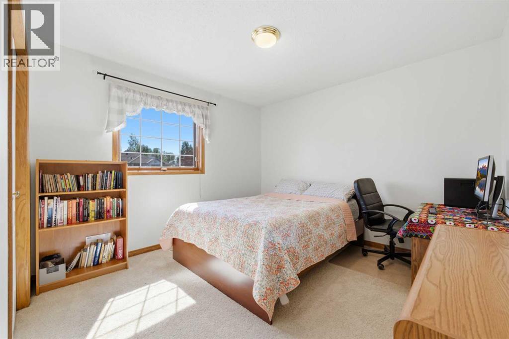 71 Woodpark Close Sw, Calgary, Alberta  T2W 6G9 - Photo 21 - A2329700