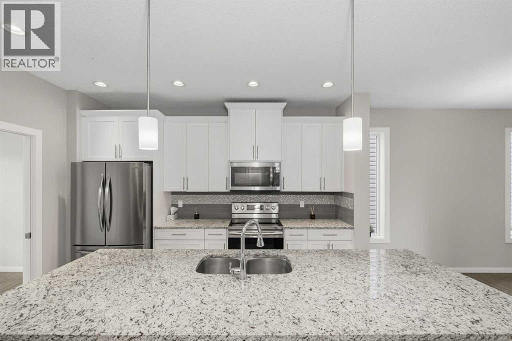 75 Legacy Glen Row SE, Calgary, Alberta  T2X 3Y9 - Photo 5 - A2336228