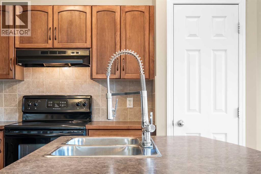 391 Cimarron Boulevard, Okotoks, Alberta  T1S 0A9 - Photo 10 - A2320761