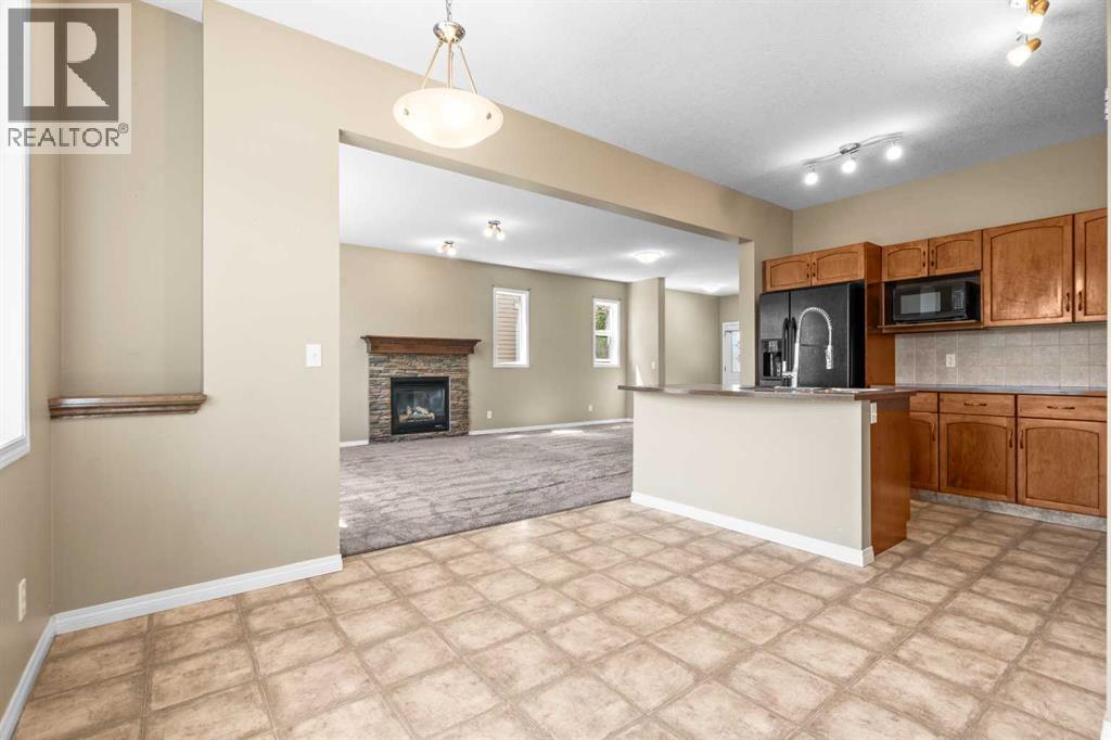 391 Cimarron Boulevard, Okotoks, Alberta  T1S 0A9 - Photo 14 - A2320761
