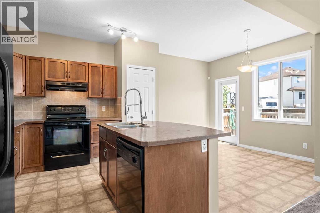 391 Cimarron Boulevard, Okotoks, Alberta  T1S 0A9 - Photo 7 - A2320761