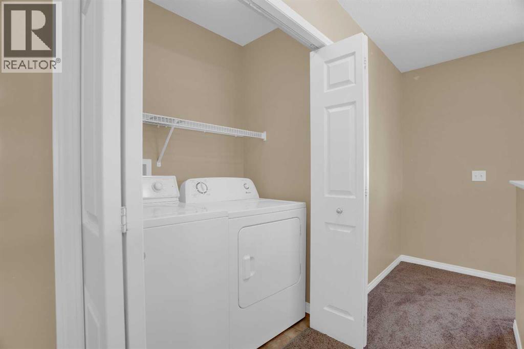 391 Cimarron Boulevard, Okotoks, Alberta  T1S 0A9 - Photo 21 - A2320761