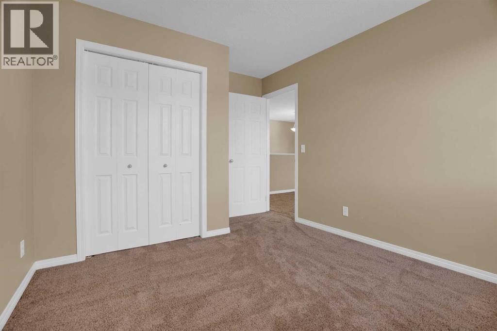 391 Cimarron Boulevard, Okotoks, Alberta  T1S 0A9 - Photo 33 - A2320761